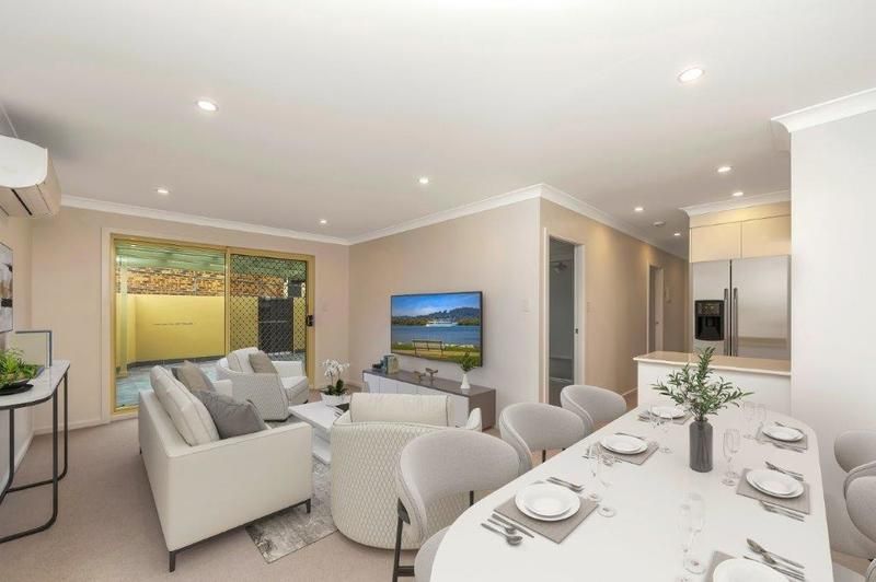 Modern, Spacious Living with Large Sunny Courtyard and Single Garage