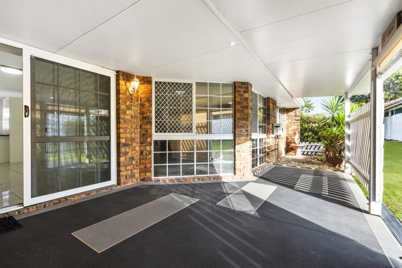 Beautiful two-bedroom, one bathroom villa with covered rear entertaining area.