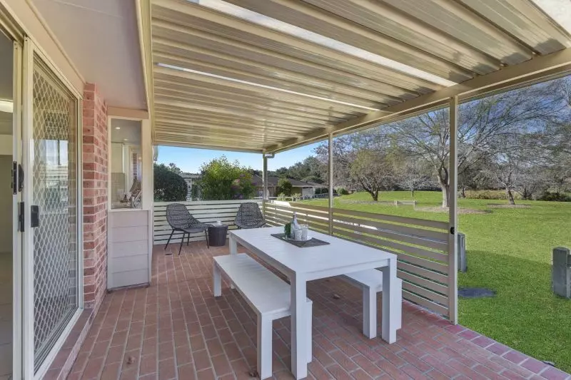 Sit back and relax on your patio! Looking onto the parkland enjoying the lifestyle here at Tarragal Glen!