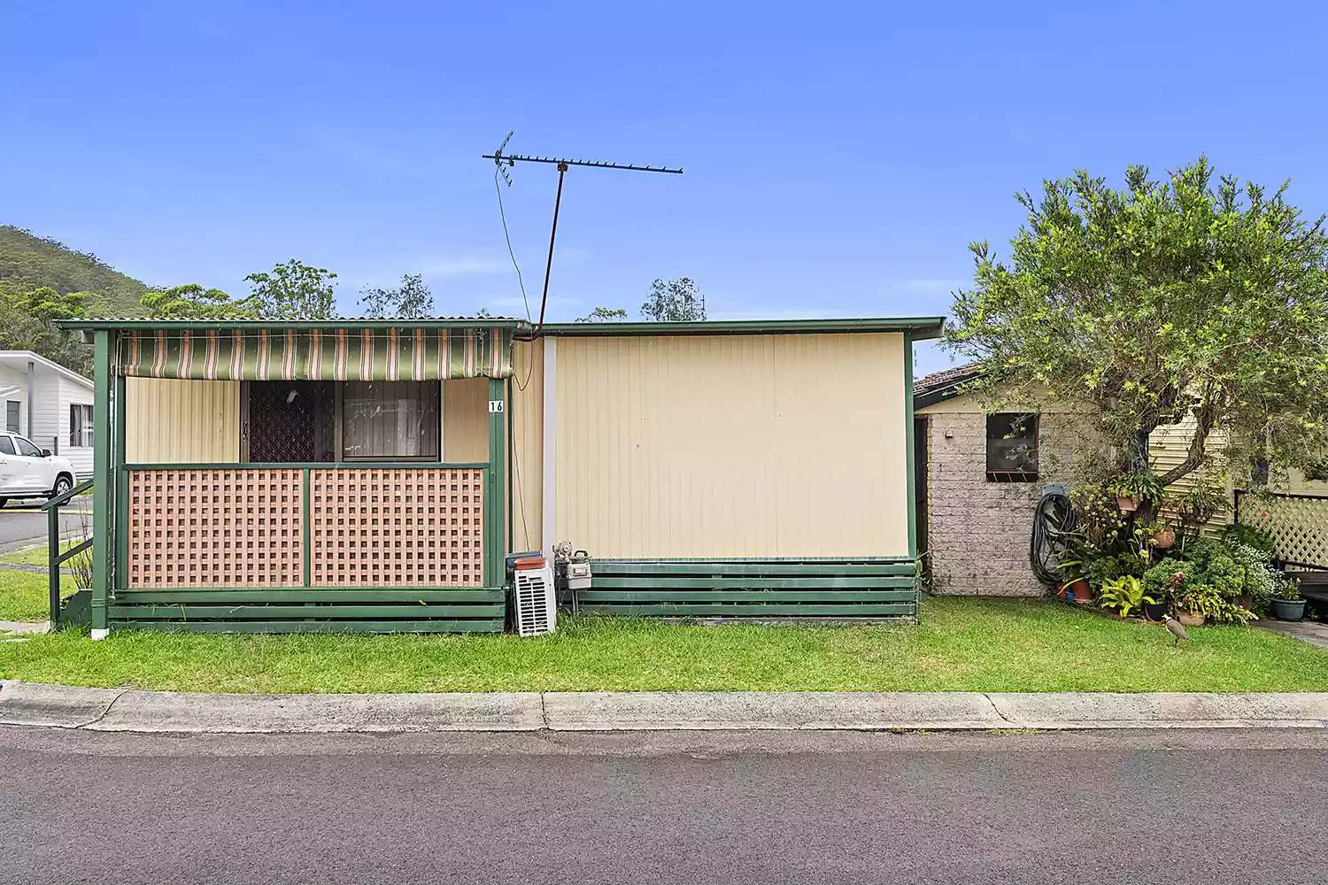 DEPOSIT TAKEN / UNDER CONTRACT - Renovate and Retire - Great Corner site with potential packed home - Carport and Storage