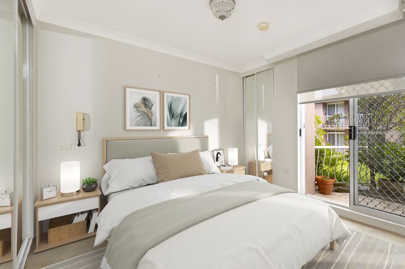 Sunny ground floor serviced apartment with garden and pool views.