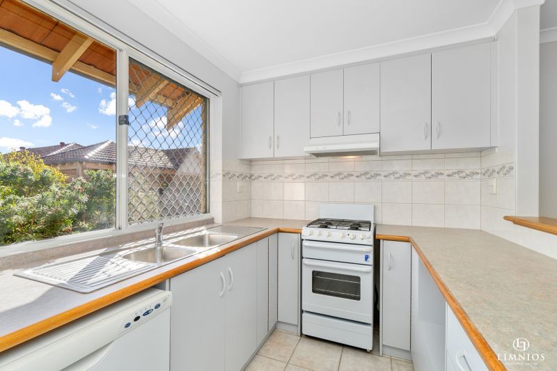 SOLD.  Live your best life in this light & bright villa in a fabulous coastal location!