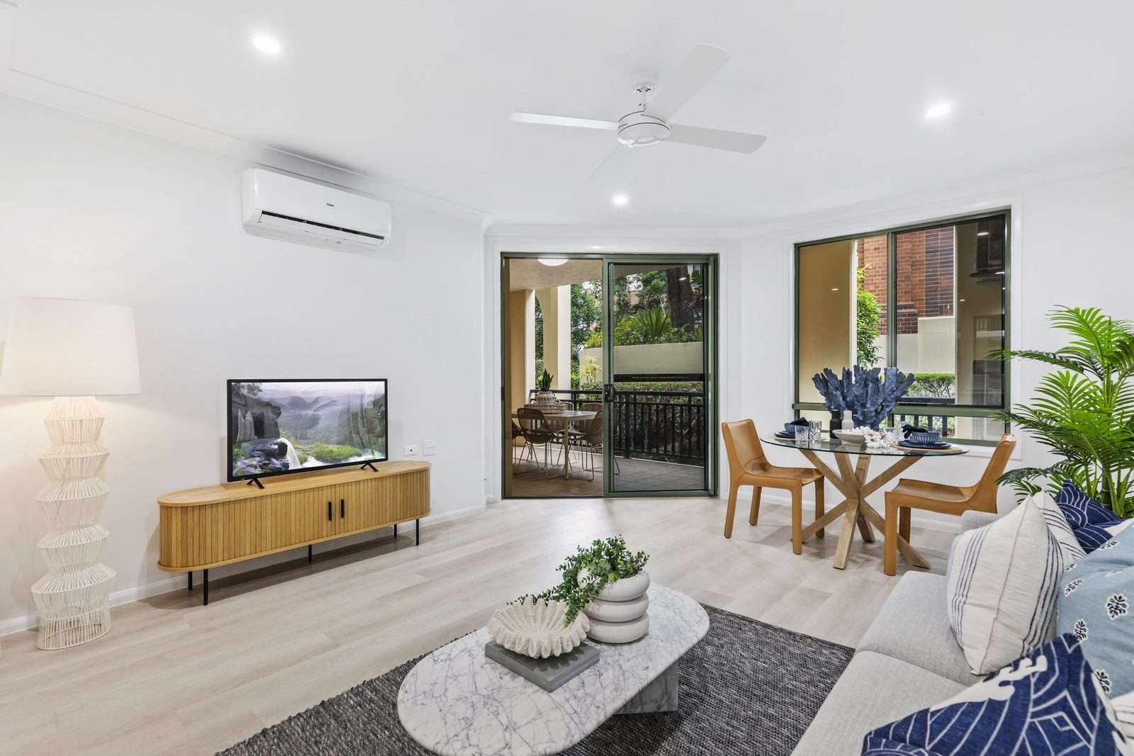 Modern one-bedroom apartment with large balcony.
