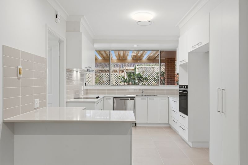 East facing enclose sunroom, perfect for the entertainer