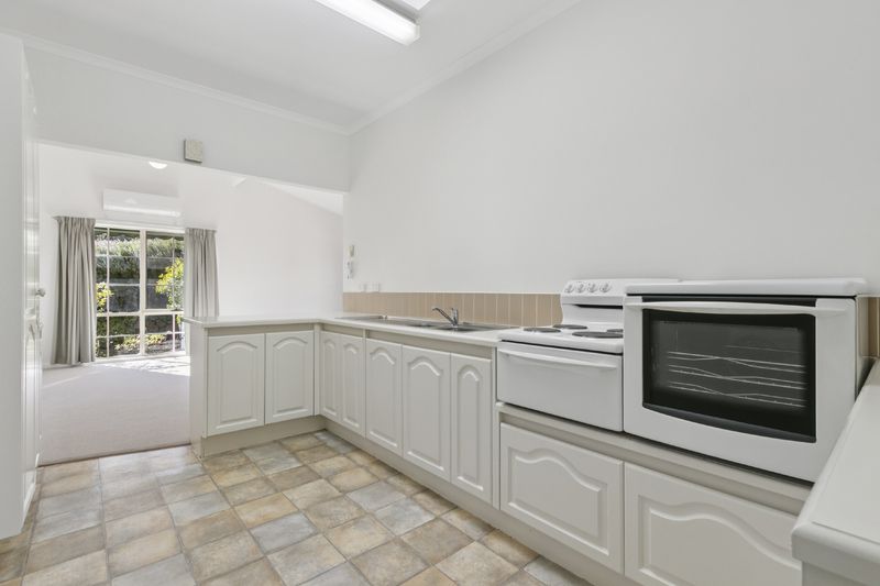 Village Heart Retreat with Vaulted Ceilings and Courtyard