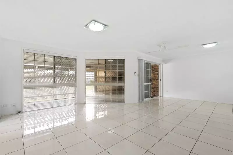 Beautiful two-bedroom, one bathroom villa with covered rear entertaining area.