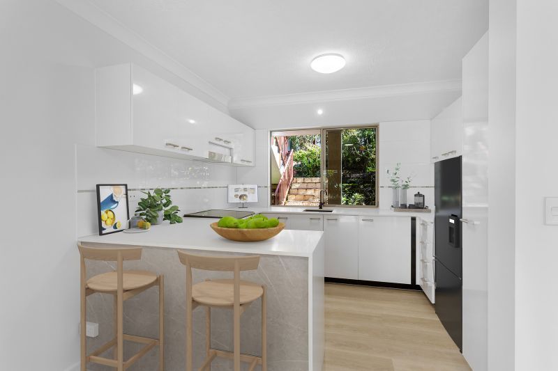 Modern ground-floor 2-bedroom villa with garden views