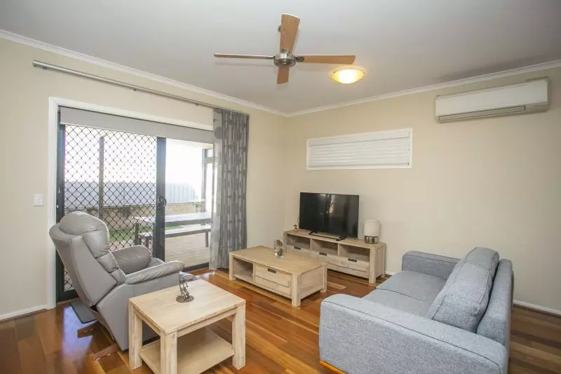 Open plan living situated on a large, elevated block.