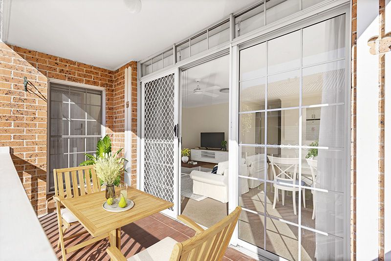 Centrally located, impeccably presented ground floor unit with large rear sunny garden courtyard.