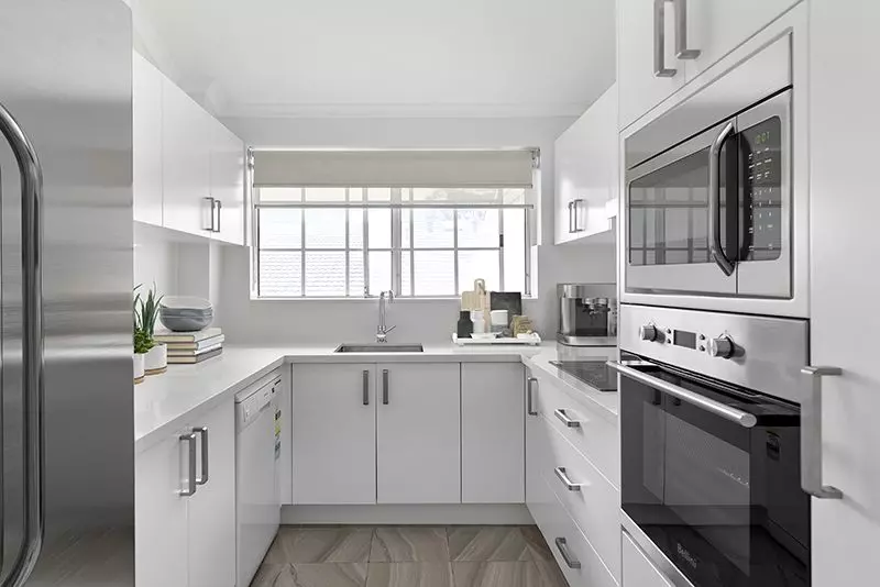 Exquisitely maintained and conveniently located sun-filled unit