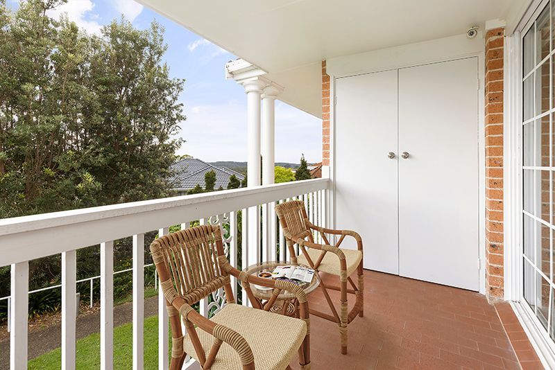 An elegant, fully renovated one-bedroom unit overlooking gardens.