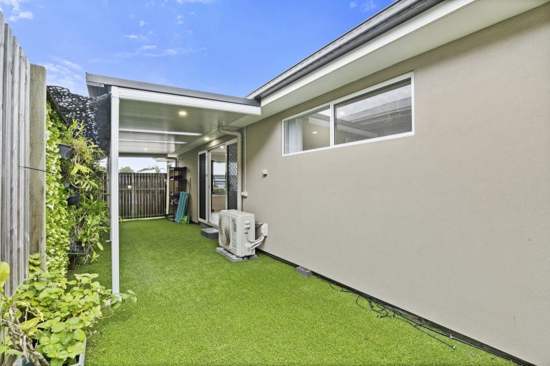Lush Garden Views & Carefree Living!