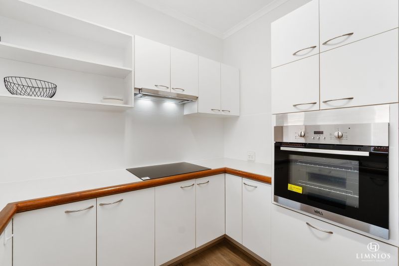 UNDER OFFER. Light-filled, Ground Floor Apartment with Wrap-Around Courtyard