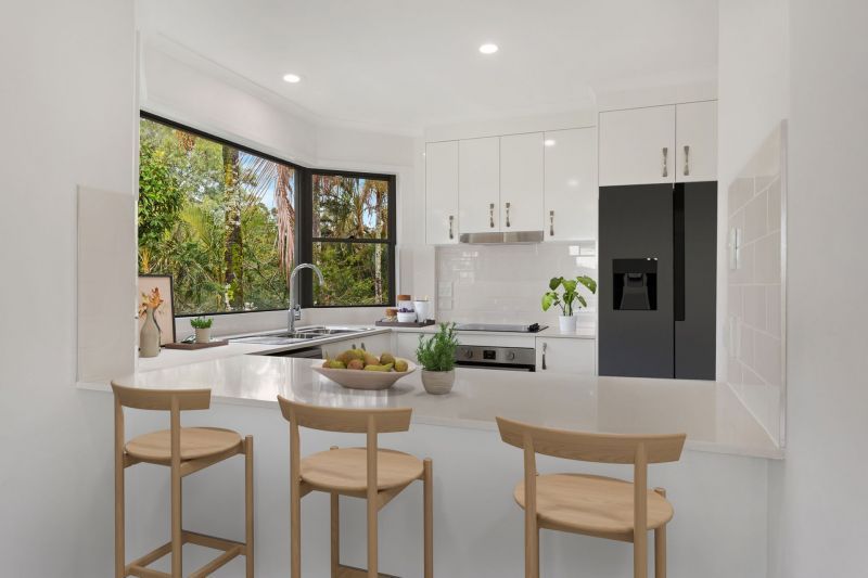 Renovated upper-level two-bedroom villa with views