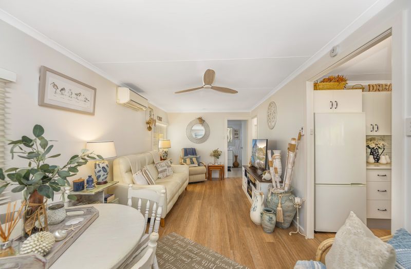 Coastal Gem! Stylish Updates & Serene Green Space