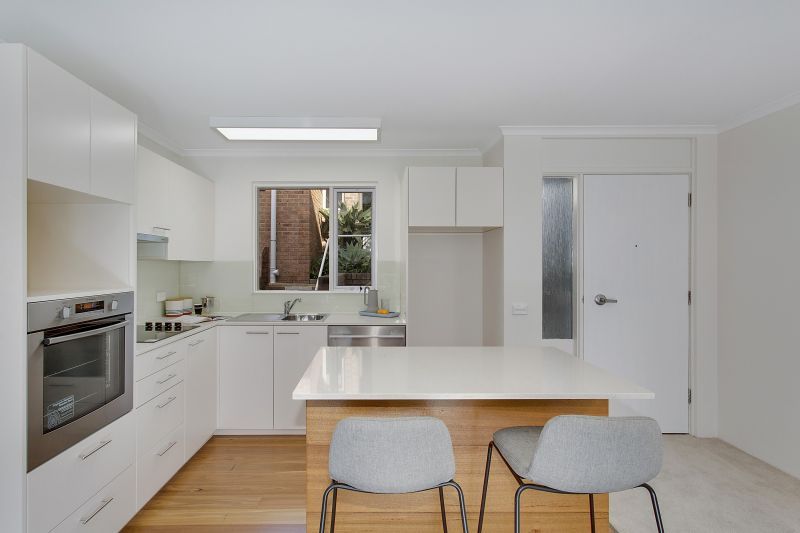 Serene two-bedroom haven overlooking lush forest