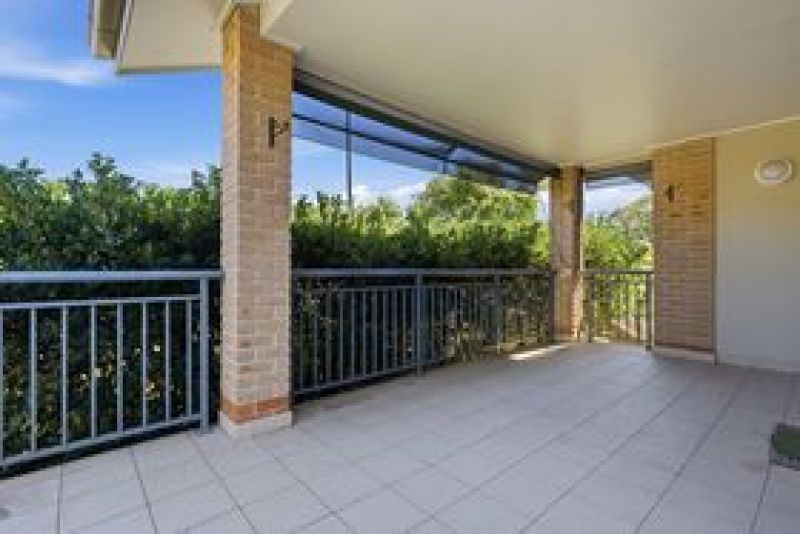 One of a kind corner unit with a wrap around balcony