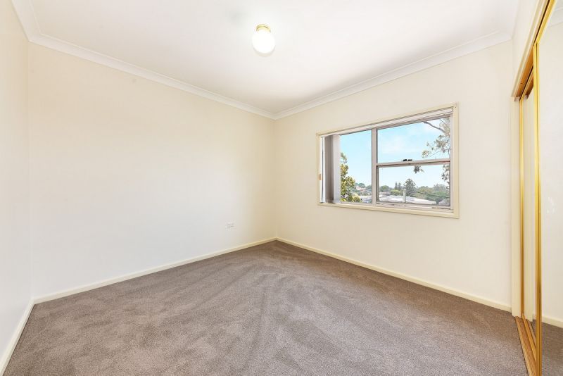 SPACIOUS  Freshly carpeted 2 bedder with both North and South facing balconies