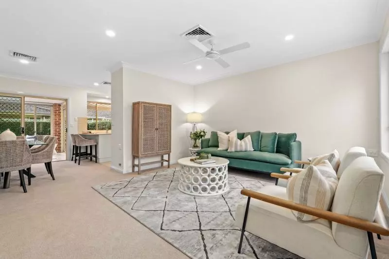 East facing villa with rear patio perfect for entertaining.