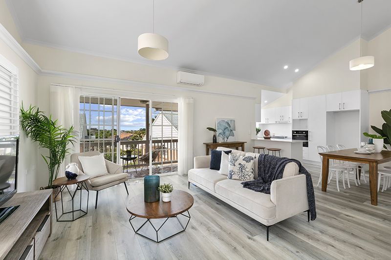 Gorgeously renovated 3 bedroom unit with modern look, level access and leafy district views.