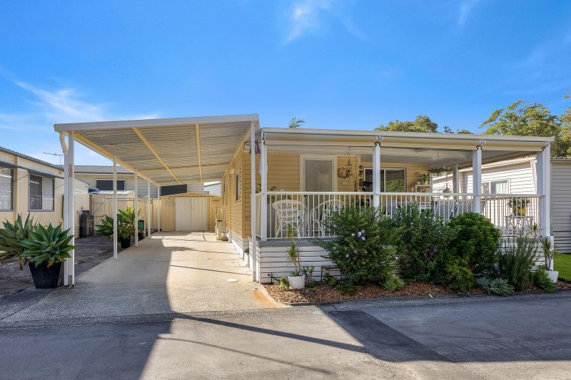 Coastal Gem! Stylish Updates & Serene Green Space