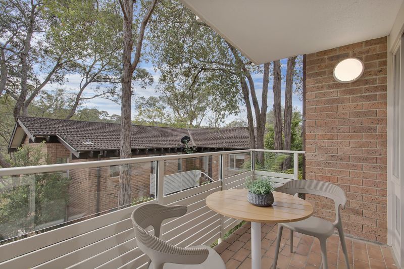 Serene two-bedroom haven overlooking lush forest
