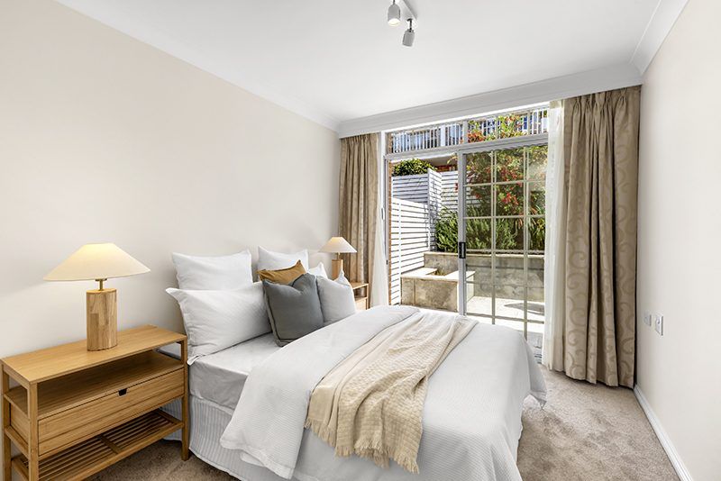 Ideally located, stylish ground floor unit near the Clubhouse with rear courtyard