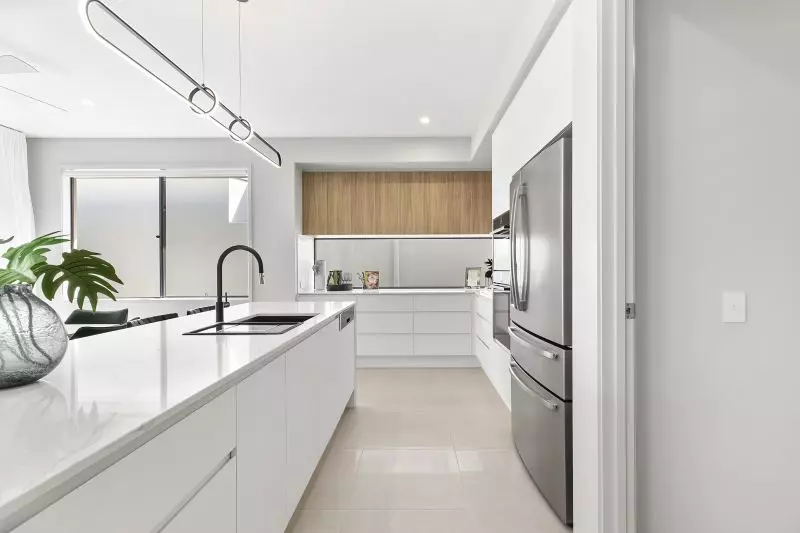 STUNNING DISPLAY HOME FACING TRANQUIL LAKE