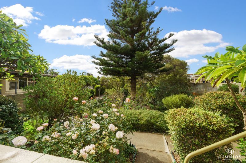 SOLD! A bright, light filled unit with a sunroom and leafy outlook