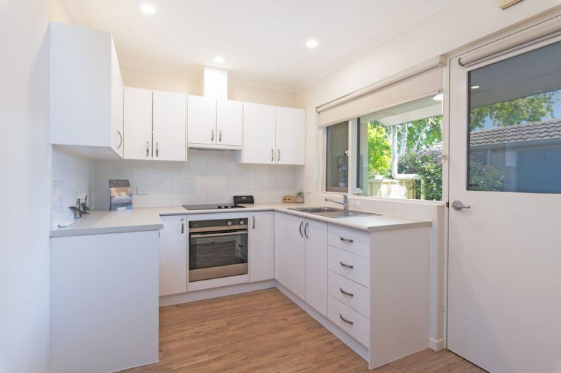This lovely unit has street frontage