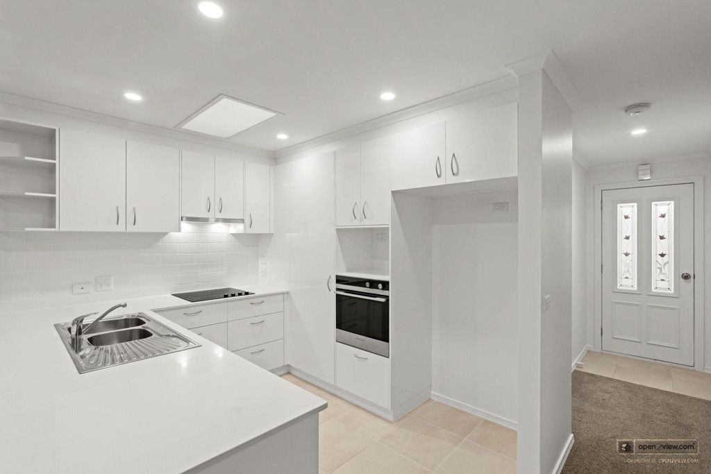 Modern Three-Bedroom Home with Private Backyard