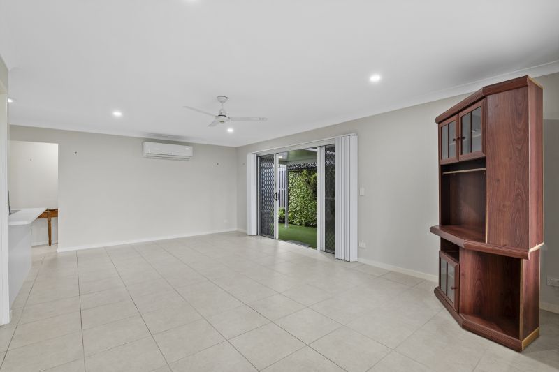 Lush Garden Views & Carefree Living!