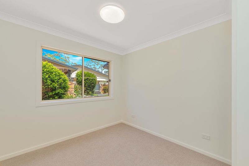Light-Filled Home with Sunroom and Space to Live