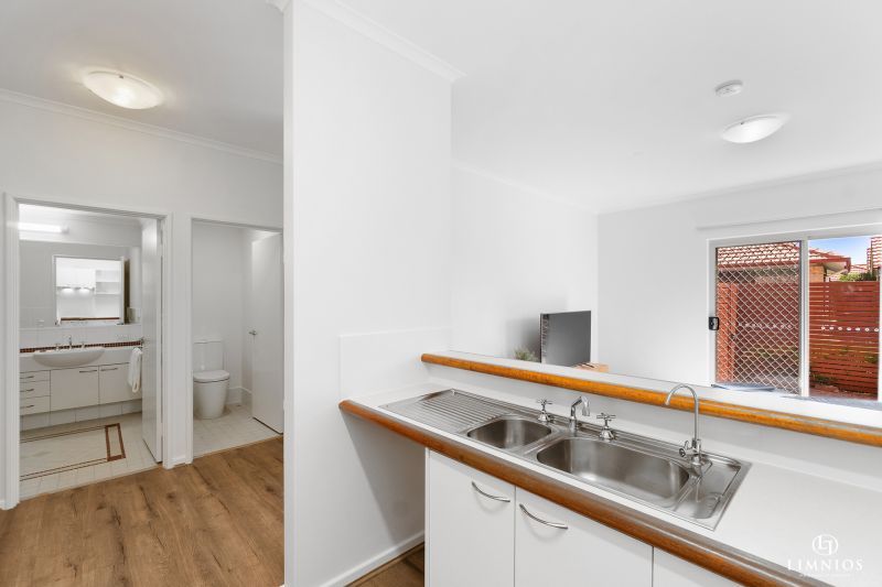 UNDER OFFER. Light-filled, Ground Floor Apartment with Wrap-Around Courtyard