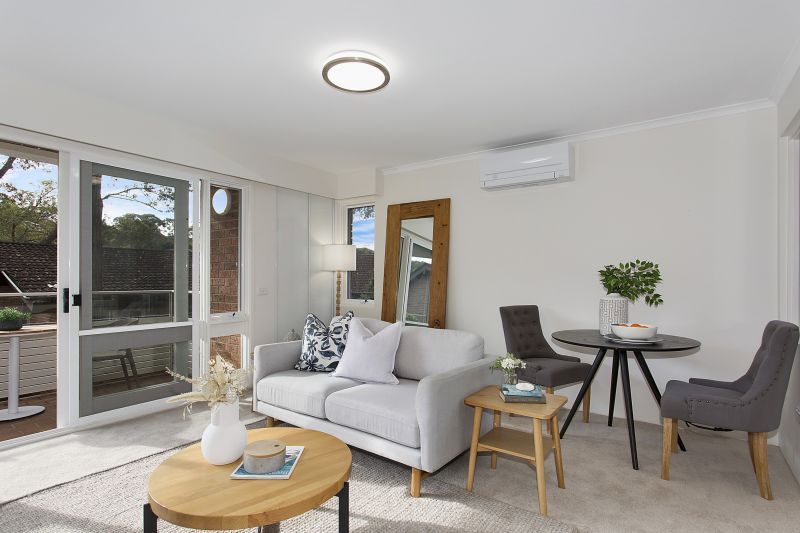 Serene two-bedroom haven overlooking lush forest