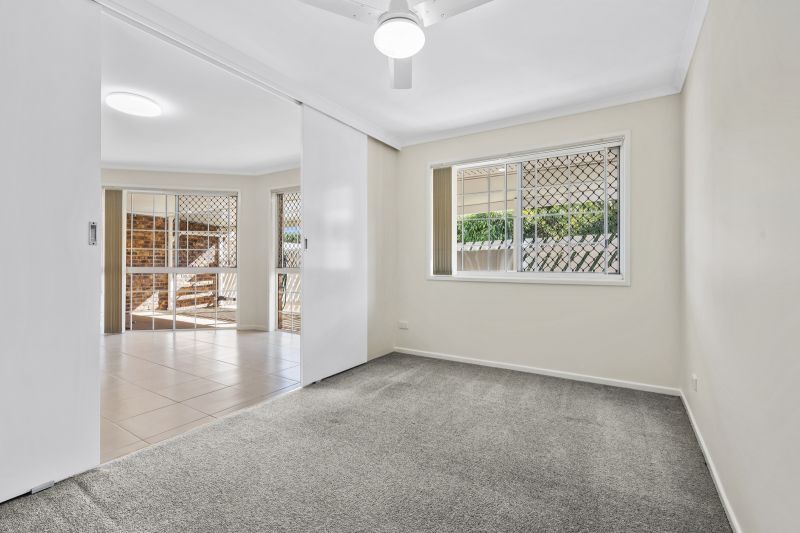 Beautiful two-bedroom, one bathroom villa with covered rear entertaining area.