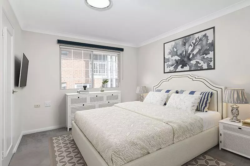 Perfectly located, renovated unit with easy ramp access and lovely district views.