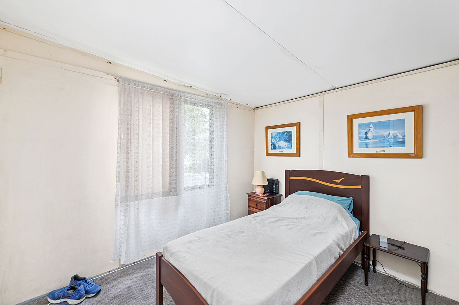 DEPOSIT TAKEN / UNDER CONTRACT - Renovate and Retire - Great Corner site with potential packed home - Carport and Storage