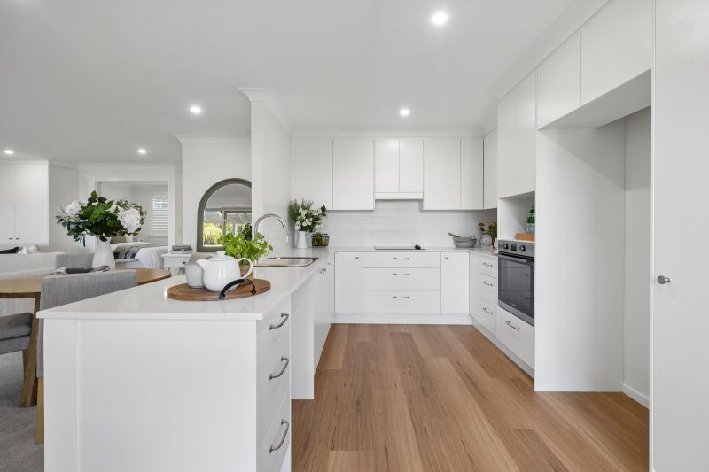 Turn-Key Two-Bedroom Living with Treetop and Water Glimpses