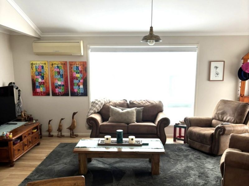 Escape to this island-inspired home!