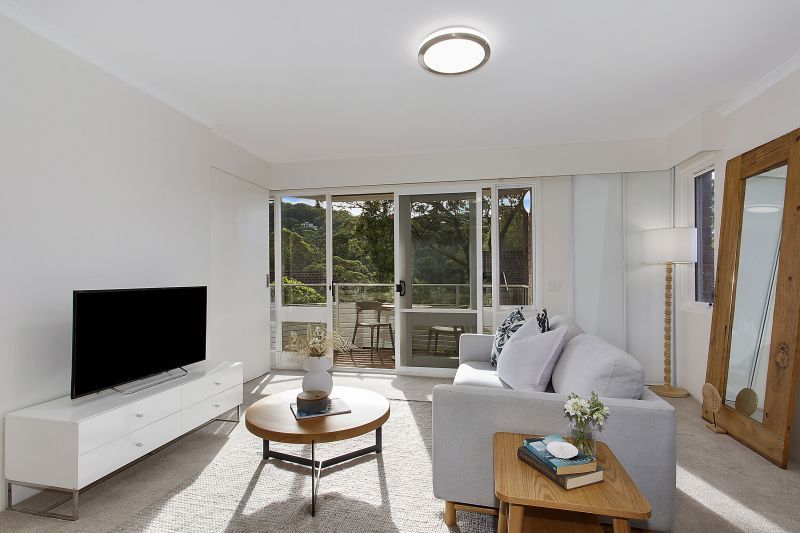 Serene two-bedroom haven overlooking lush forest