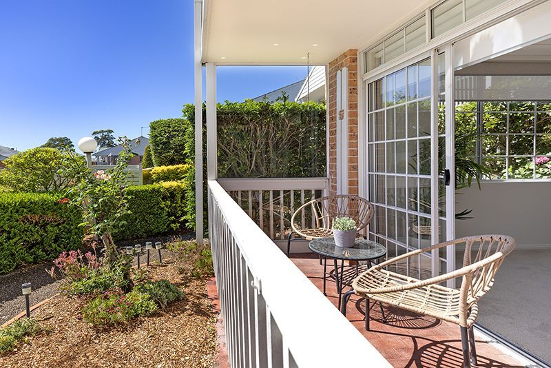 Surrounded by lovely gardens, beautifully renovated ground floor sun-filled unit, right opposite the croquet lawn.