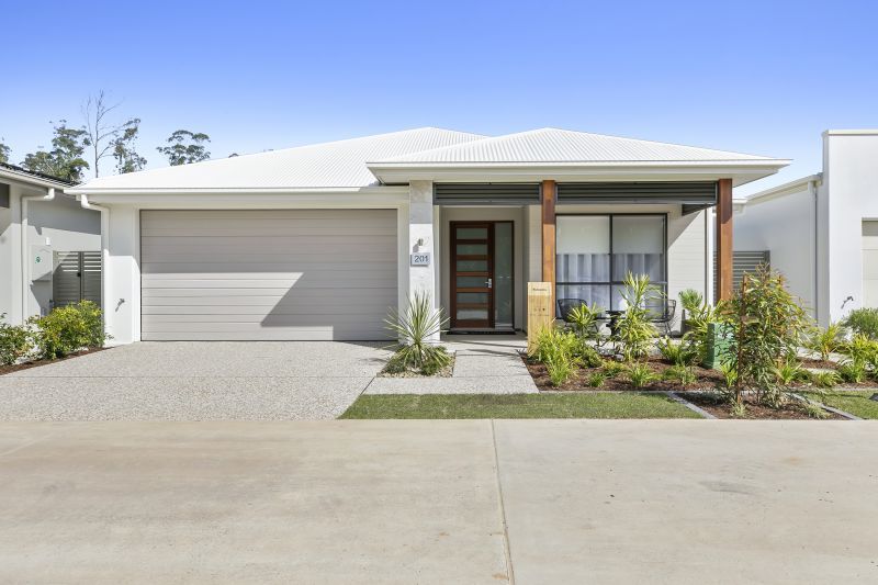 STUNNING DISPLAY HOME FACING TRANQUIL LAKE