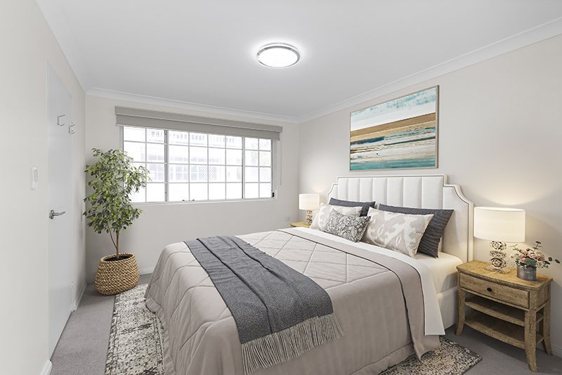 An elegant, fully renovated one-bedroom unit overlooking gardens.