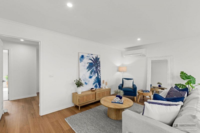 Beautifully Refurbished Two-Bedroom Home Opposite the Community Centre