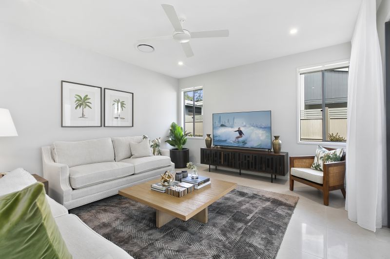 STUNNING DISPLAY HOME FACING TRANQUIL LAKE