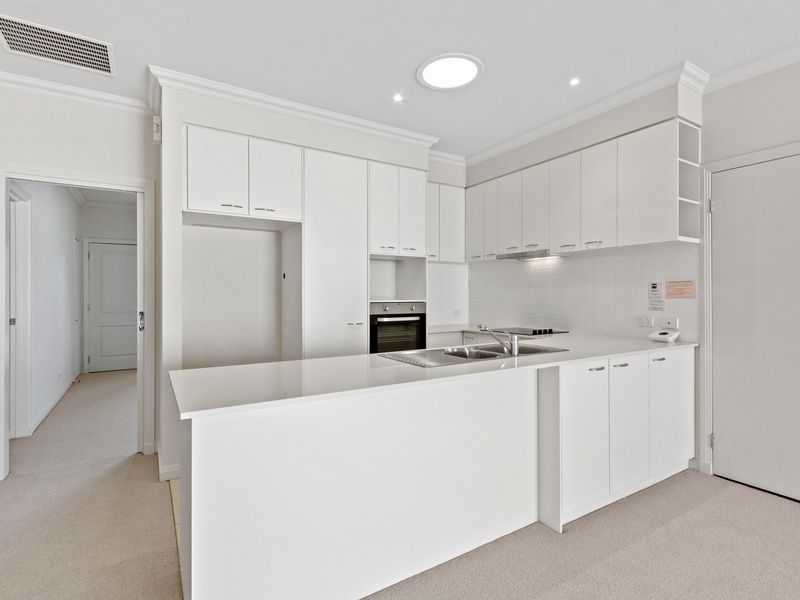 Charming Home with Stylish Updates in a Lovely Tree-Lined Setting