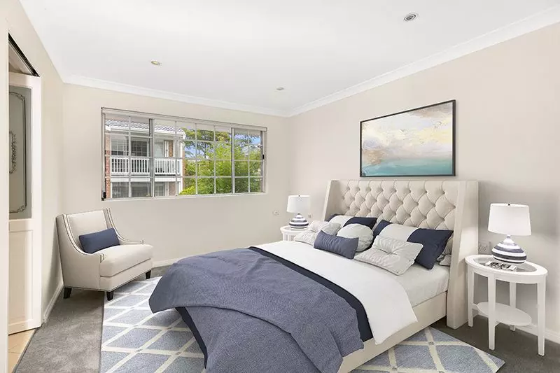 Perfectly located unit overlooking lush, green gardens.