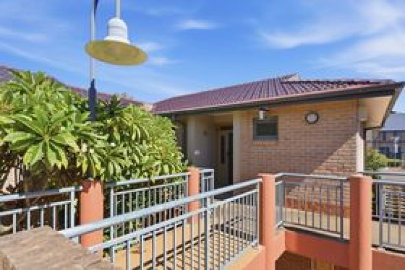 One of a kind corner unit with a wrap around balcony
