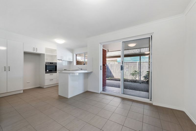 Modern home in tightly-held community